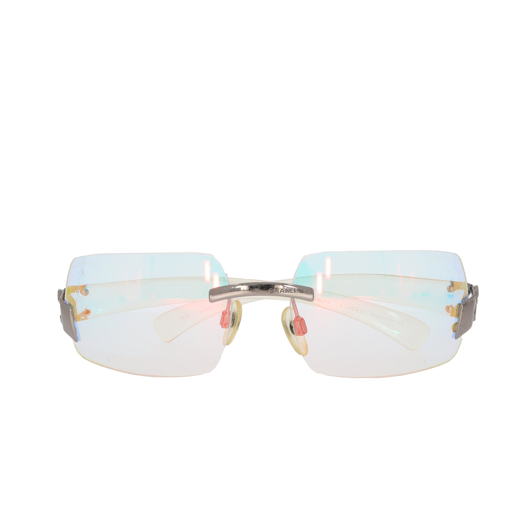 Chanel Rimless Sunglasses Featuring Small Crystal Logos  Italy  QUIET WEST